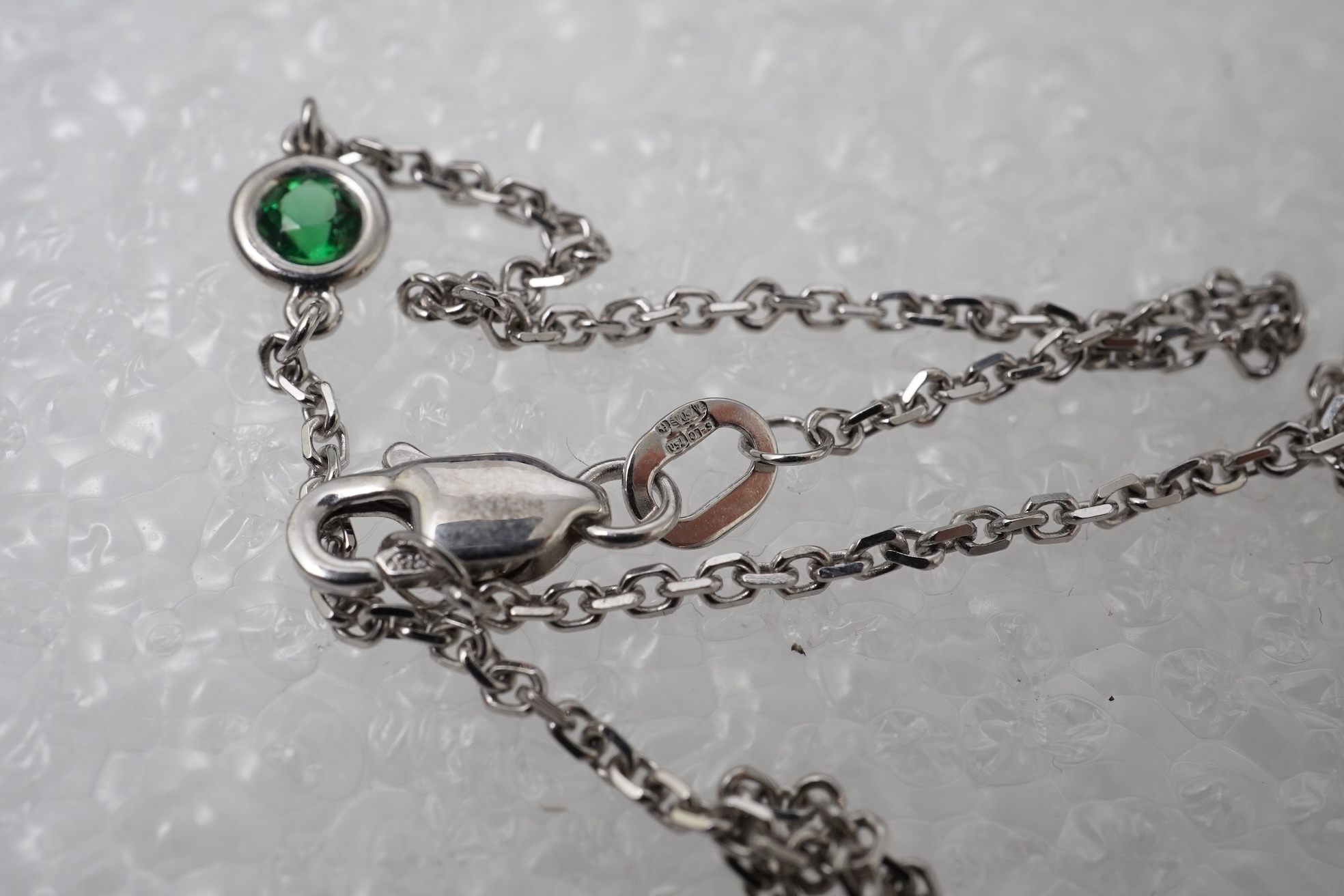 A diamond and tsavorite pendant necklace